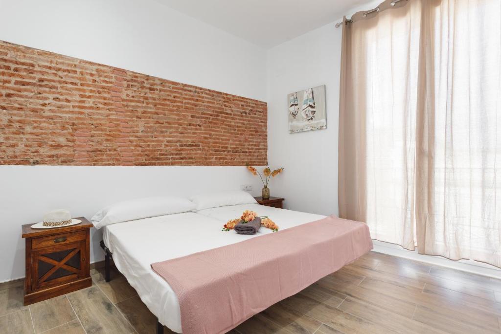 Postel nebo postele na pokoji v ubytování Matarolux 7