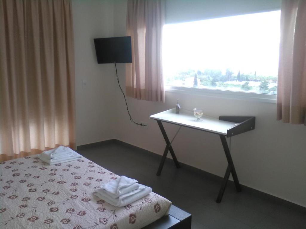 Posteľ alebo postele v izbe v ubytovaní Fevronia's Rooms