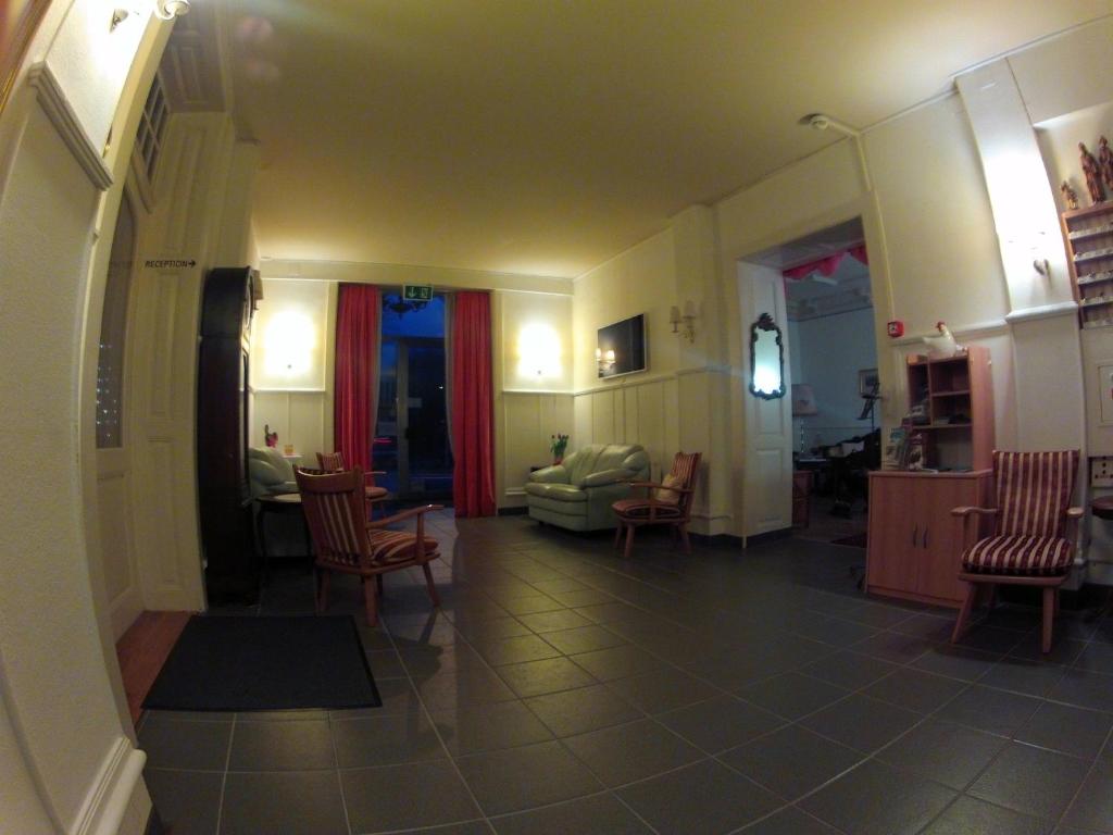 Posezení v ubytování BasicRooms Hotel