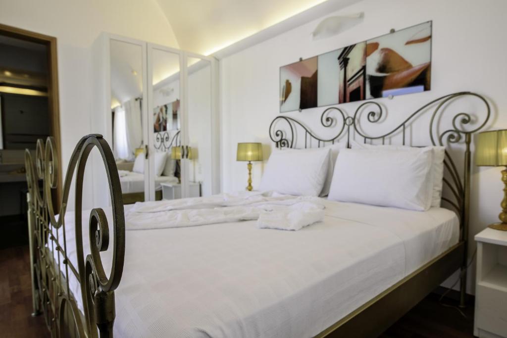 Postel nebo postele na pokoji v ubytování La Mer Deluxe Hotel & Spa