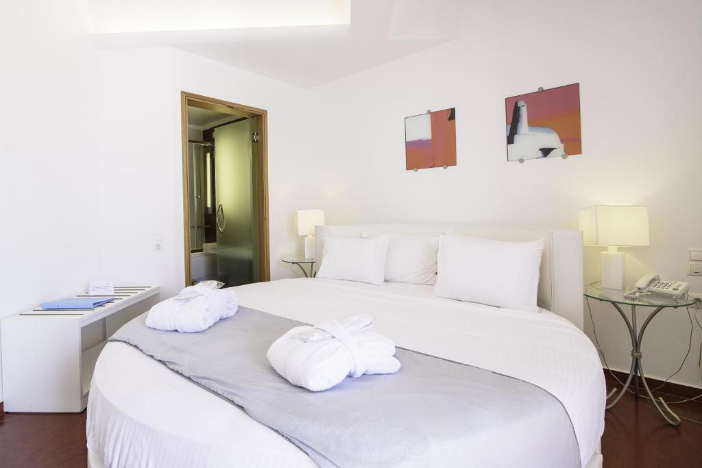 Postel nebo postele na pokoji v ubytování La Mer Deluxe Hotel & Spa