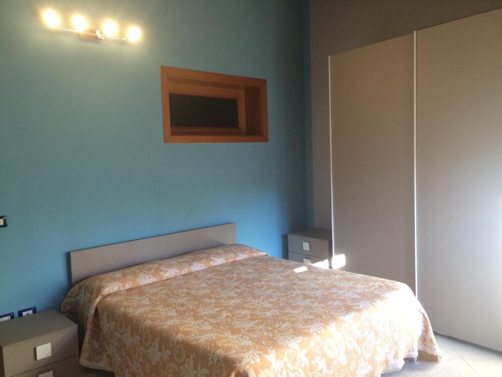 Posteľ alebo postele v izbe v ubytovaní Appartamento Arco