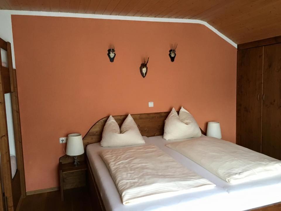 Postel nebo postele na pokoji v ubytování Hotel Karwendelblick