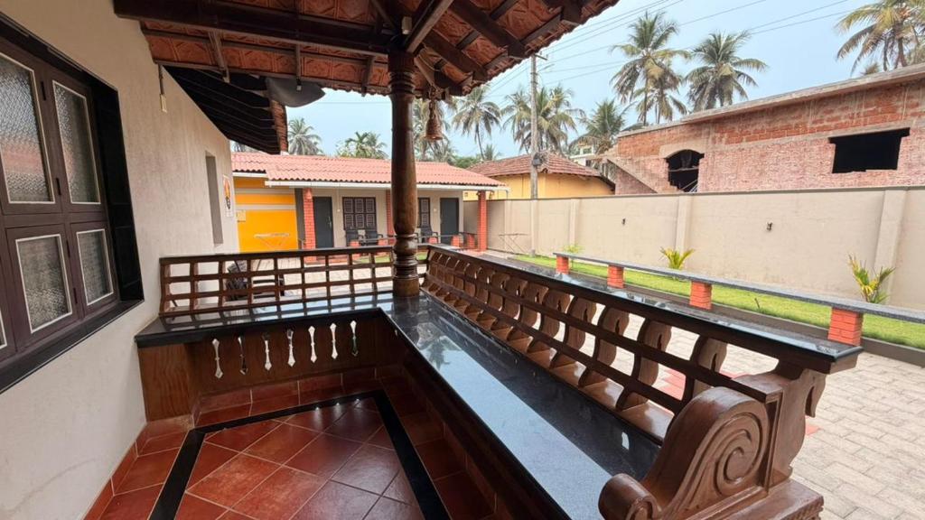 a view from the balcony of a house at Coastal Hideout Family Cottages Malpe Beach in Malpe