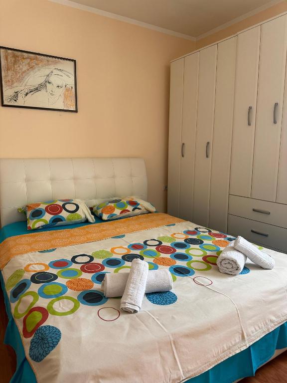 Postel nebo postele na pokoji v ubytování Apartmani VV