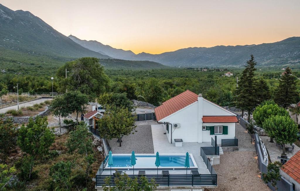 an aerial view of a house with a swimming pool at Villa Ika in Gomila
