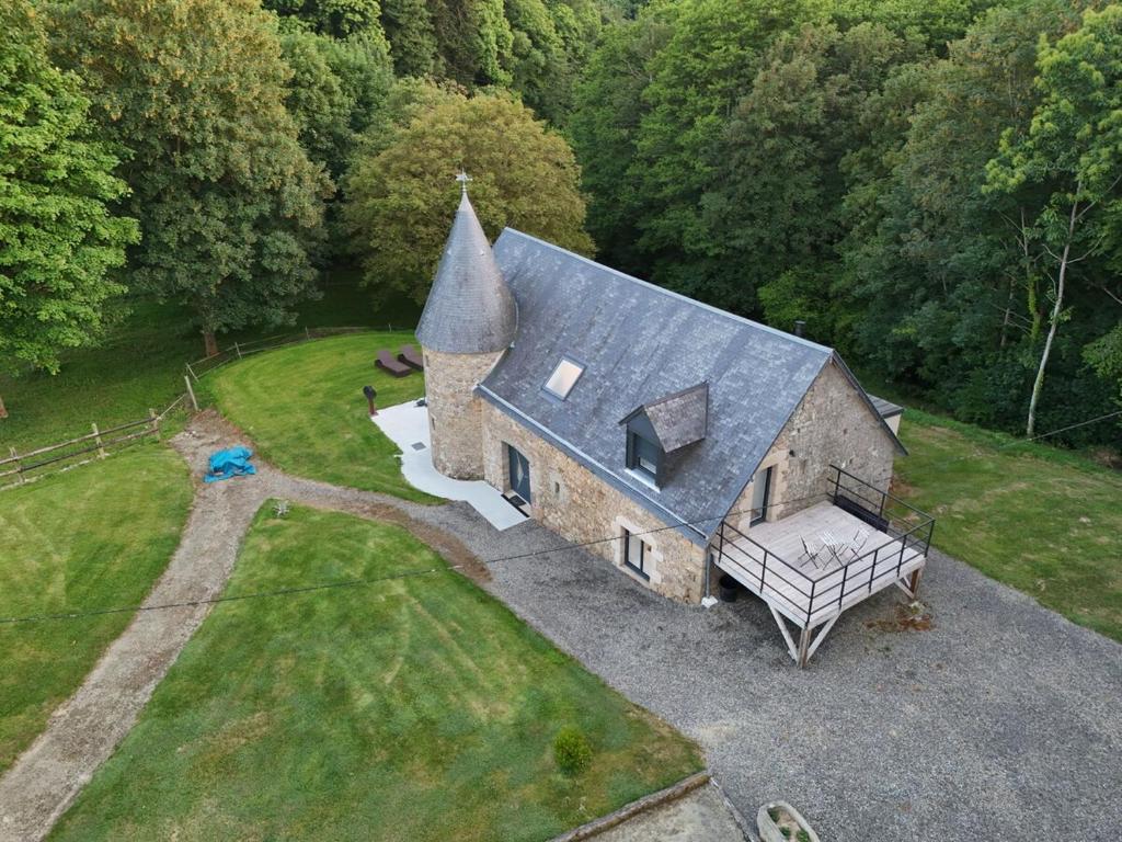 an aerial view of a large stone house at Gîte Les Douets in Isigny-le-Buat