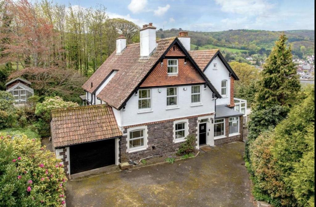 an aerial view of a house with a garage at Bay View Porlock Bed & Breakfast in Porlock
