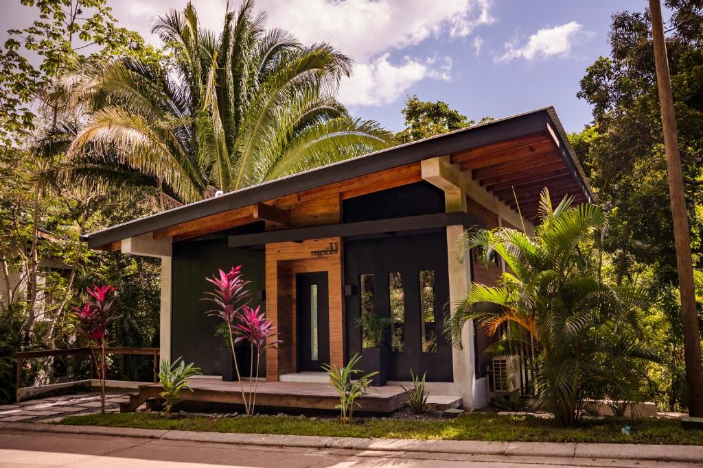 a house with a black and white facade at Villa Sea Breeze in West End