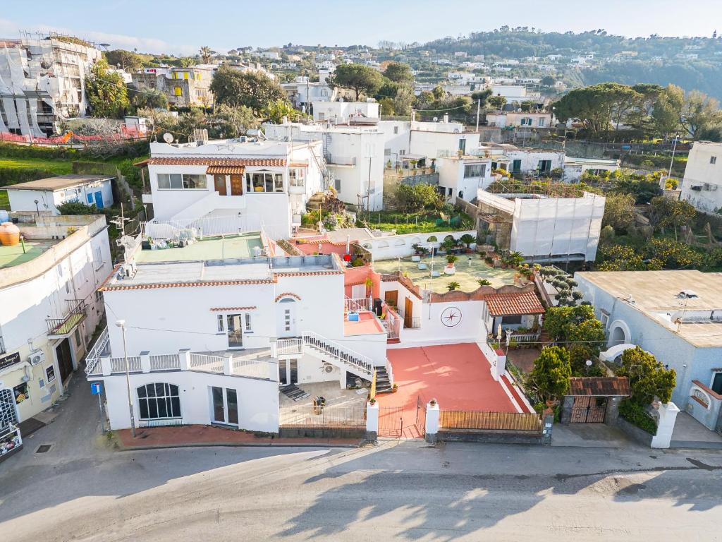 an aerial view of a city with white buildings at La Perla Sul Mare in Forio d'Ischia