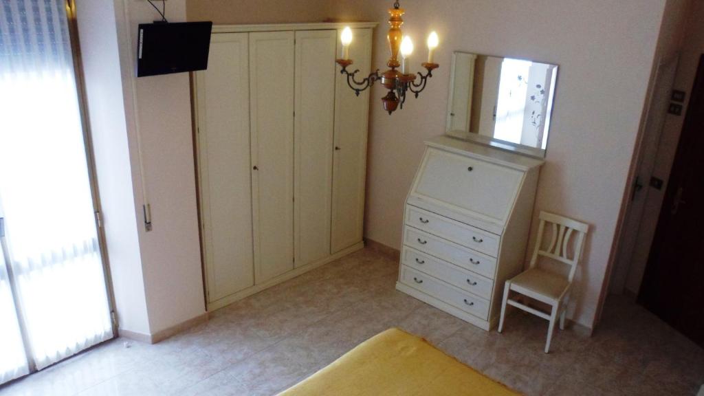 TV a/nebo společenská místnost v ubytování Hotel Reali