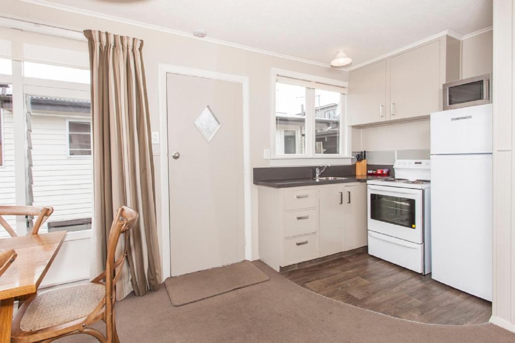 Kuchyň nebo kuchyňský kout v ubytování Wanaka View Motel