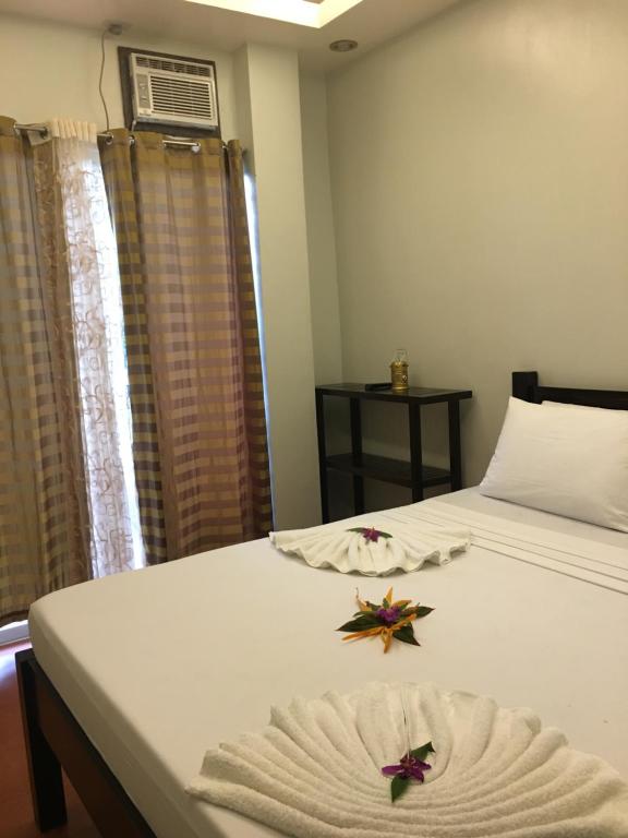 Postel nebo postele na pokoji v ubytování Seaslugs Travellers Inn