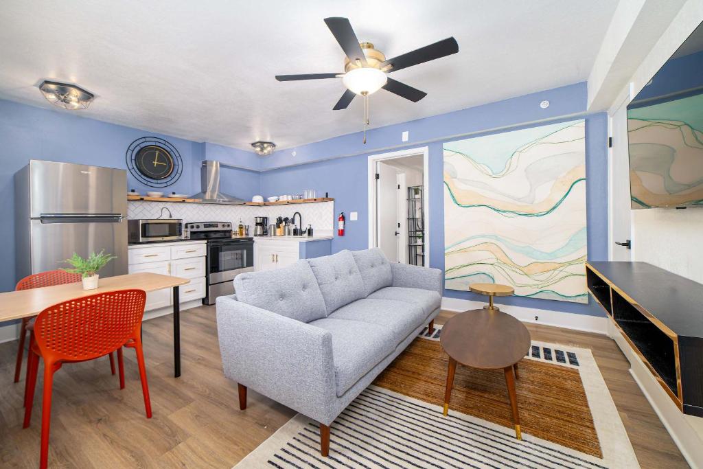 a living room with a couch and a table at Sojourn's Harborage Pet-Friendly # 3 in Norfolk