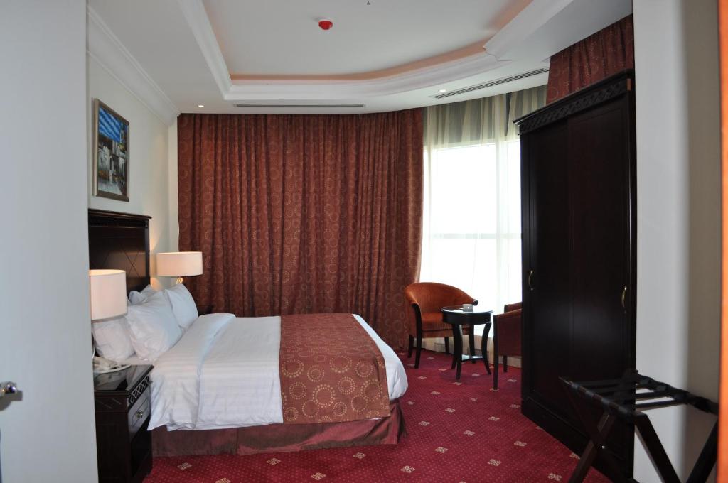 Postel nebo postele na pokoji v ubytování Musherib Hotel