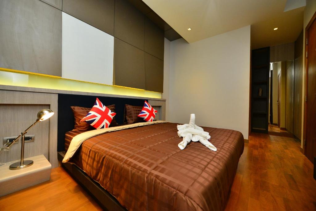 Postel nebo postele na pokoji v ubytování Bukit Pool Villas - SHA Extra Plus