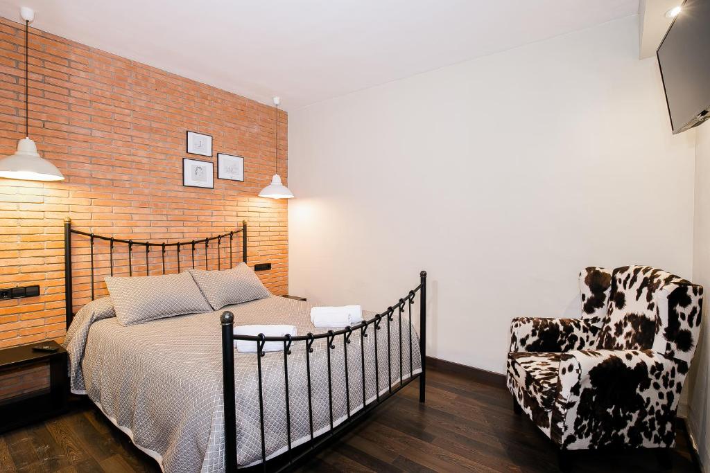 Postel nebo postele na pokoji v ubytování Hotel Montmar