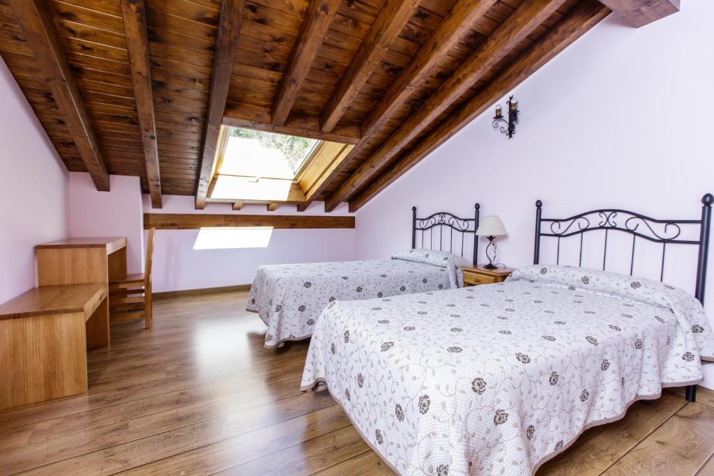 Cama o camas de una habitación en La Dobra de liebana