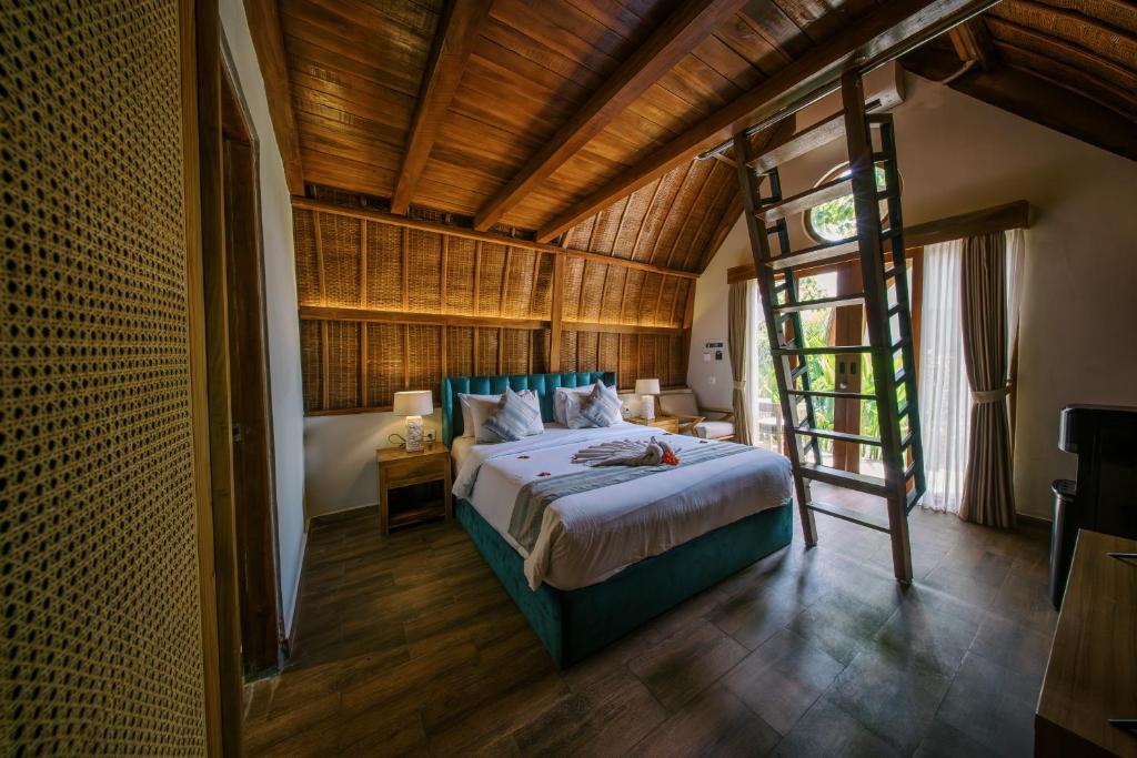 Abian Klumpu Villa & Spa Sanur Bali - Dreibettzimmer
