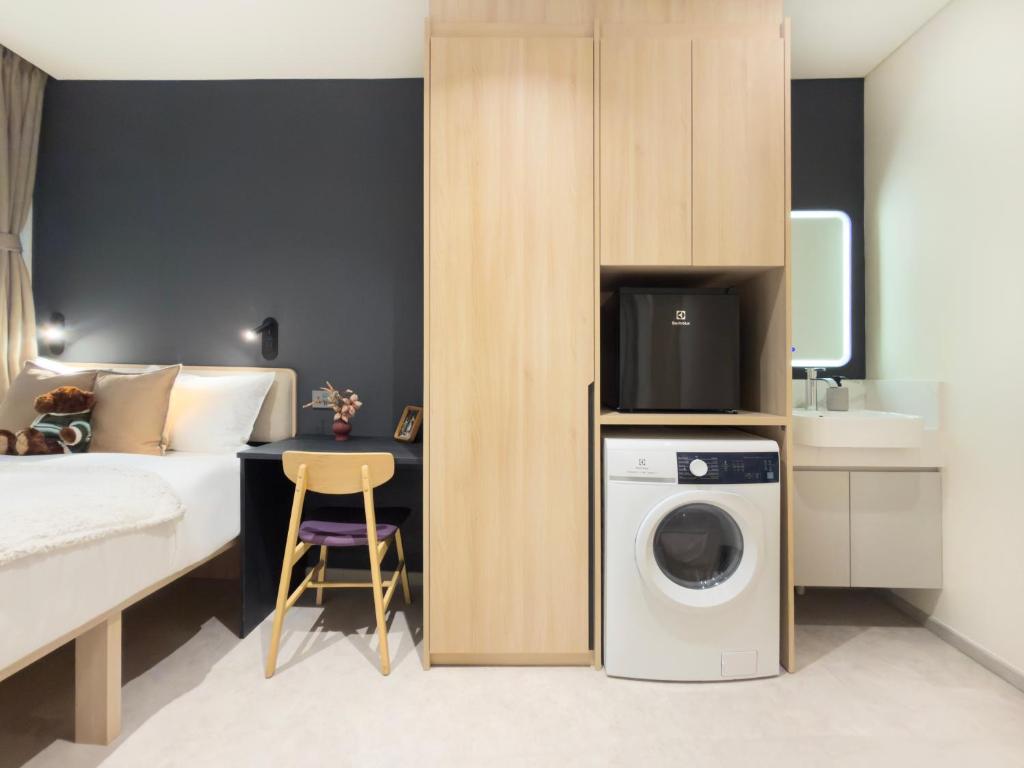 Kuchyň nebo kuchyňský kout v ubytování Coliwoo Midtown - CoLiving