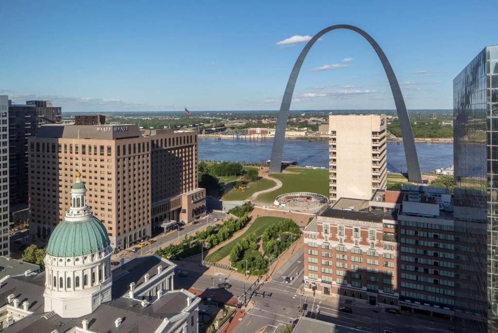 an aerial view of a city with the gateway arch at Hyatt Regency Saint Louis at The Arch in Saint Louis