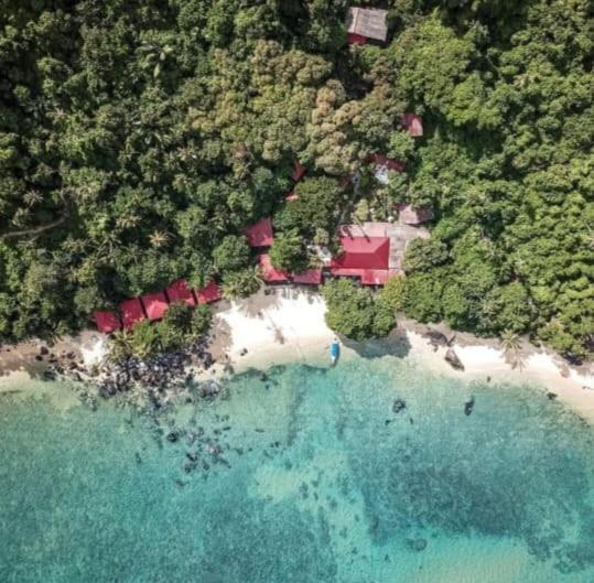 an aerial view of a resort and a beach at Melina Beach Resort in Tioman Island