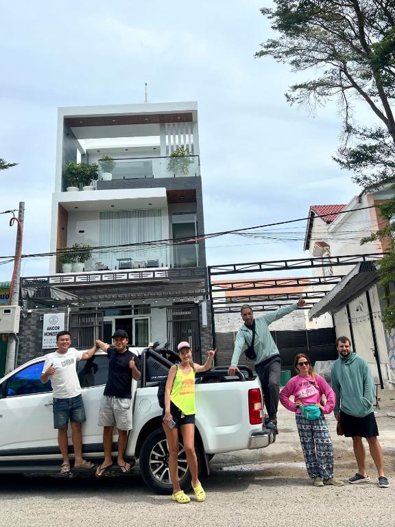 a group of people standing in the back of a truck at Ancor Homestay in Phan Rang–Tháp Chàm