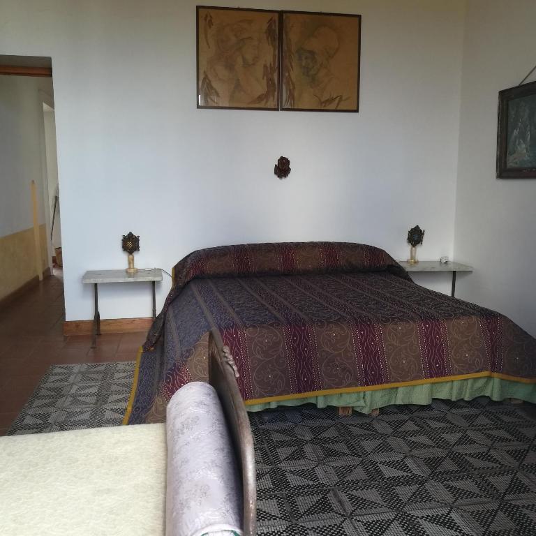 Postel nebo postele na pokoji v ubytování La Locanda del Barbablù