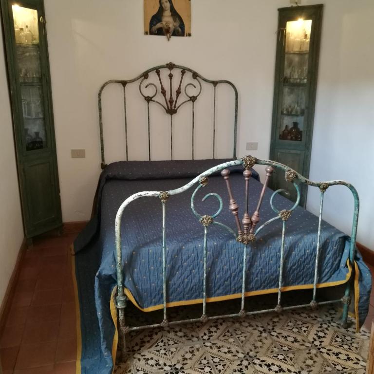 Postel nebo postele na pokoji v ubytování La Locanda del Barbablù