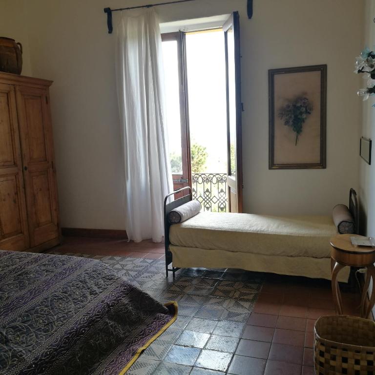 Postel nebo postele na pokoji v ubytování La Locanda del Barbablù