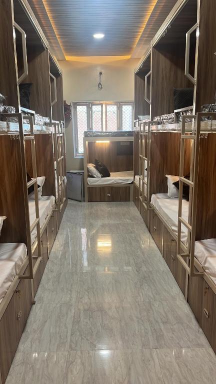 a room with several bunk beds in it at Shiv ghar Stay in Varanasi
