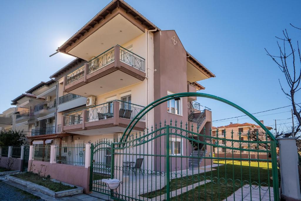 a building with a gate in front of it at Villa Ilias in Flogita
