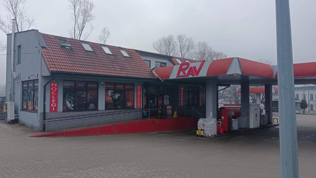 a gas station with a kra sign on it at Hostel RAV in Tomaszów Mazowiecki