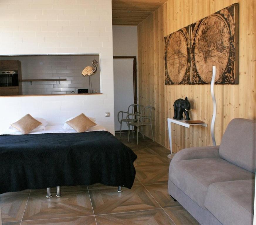 Llit o llits en una habitació de What Else Hotel