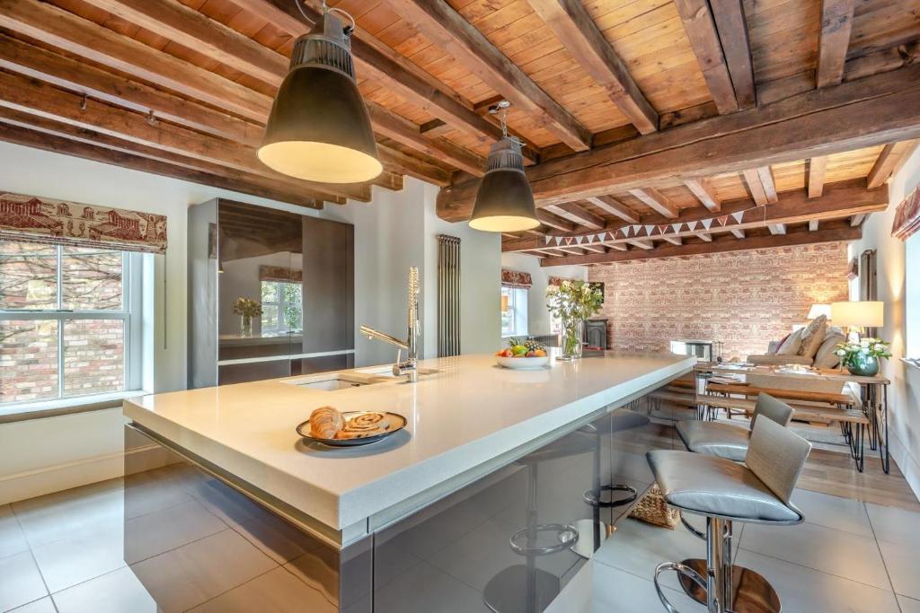 a kitchen with a large island with a counter top at 2 Bed in Caenby oc-o35799 in Caenby