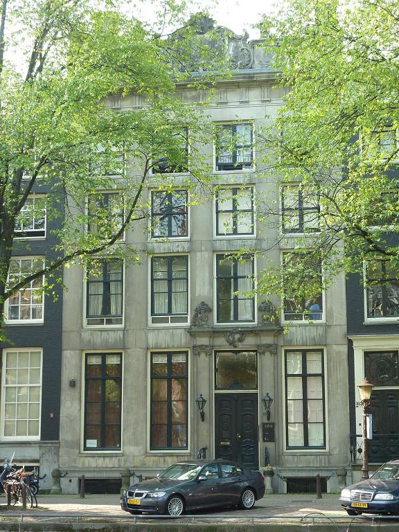a car parked in front of a large building at Cloud9 in Bergen op Zoom