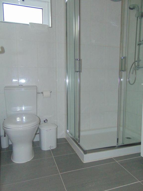 Koupelna v ubytování Funileiro, apartamentos e quartos