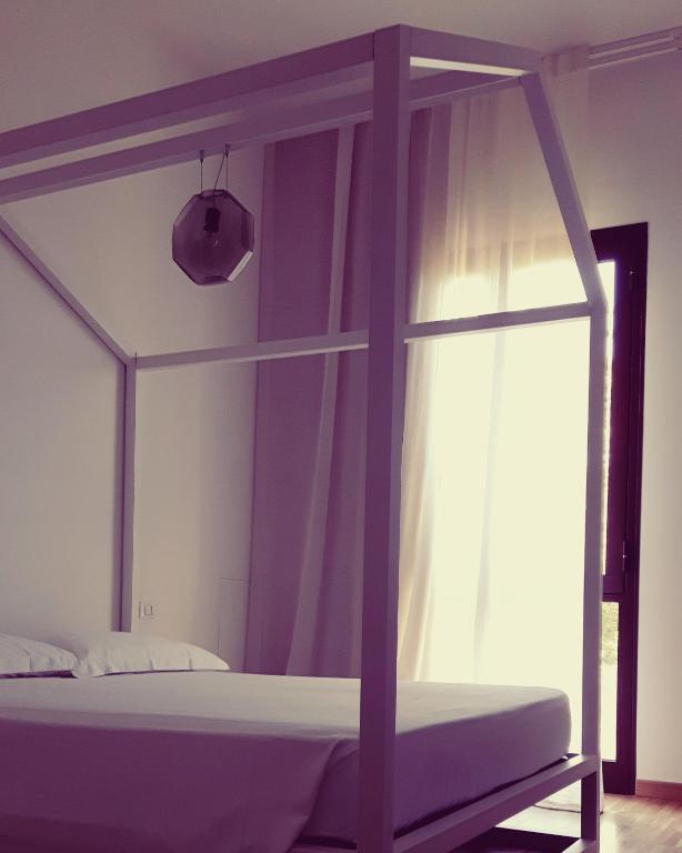 Postel nebo postele na pokoji v ubytování Casa d'Autore