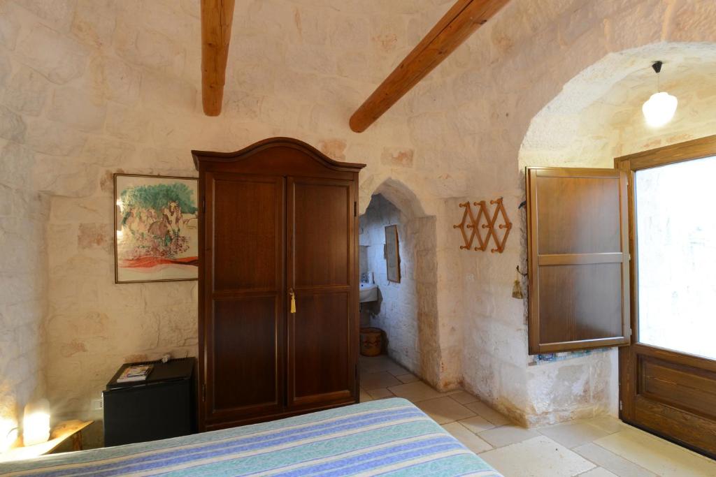 Postel nebo postele na pokoji v ubytování B&B La Gufa