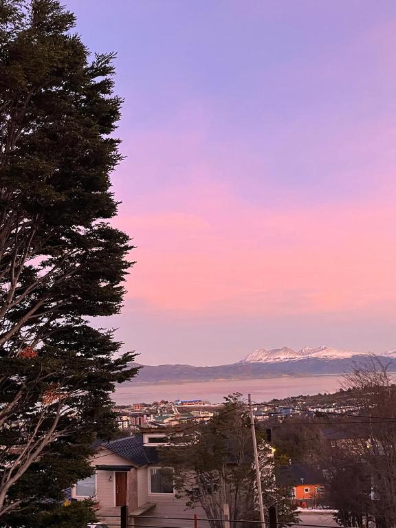 a view of a city with mountains in the distance at Casa de Ushuaia in Ushuaia