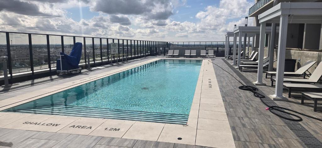 a swimming pool on the roof of a building at Corner unit 3 bath and 2 bed in Vaughan