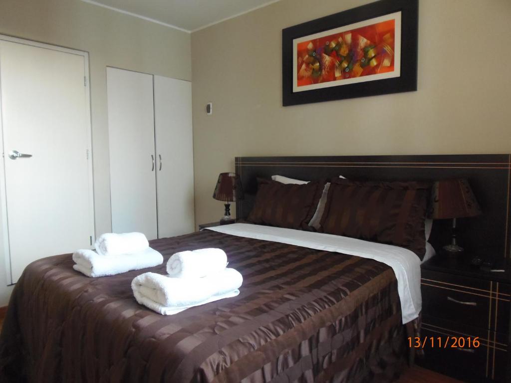 Postel nebo postele na pokoji v ubytování B&B Cusing Wasi