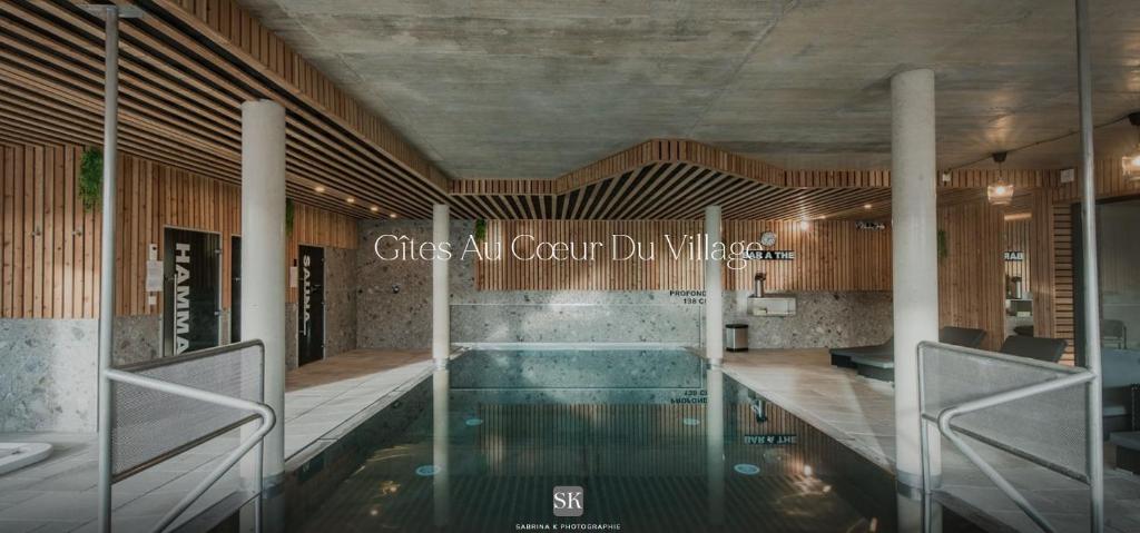 a rendering of a swimming pool in a building at L'ORIGINE in Saint-Aubin