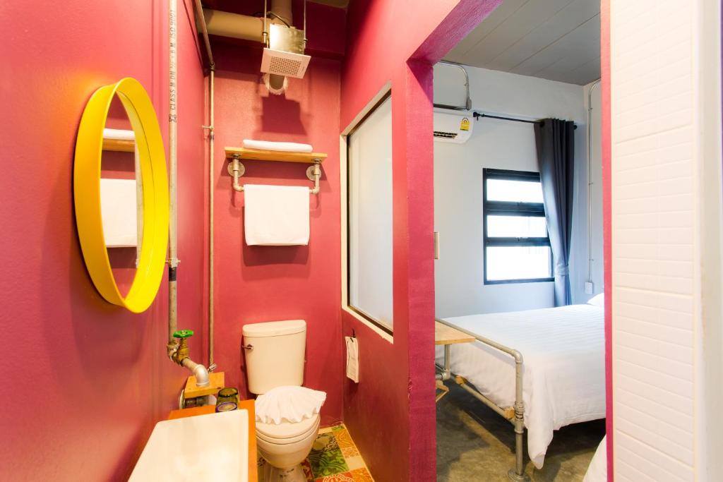 Postel nebo postele na pokoji v ubytování Bloo Hostel