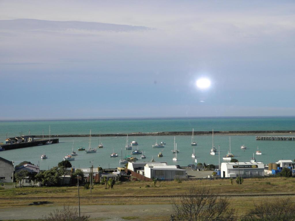 a view of a harbor with boats in the water at Affordable On Arun in Oamaru