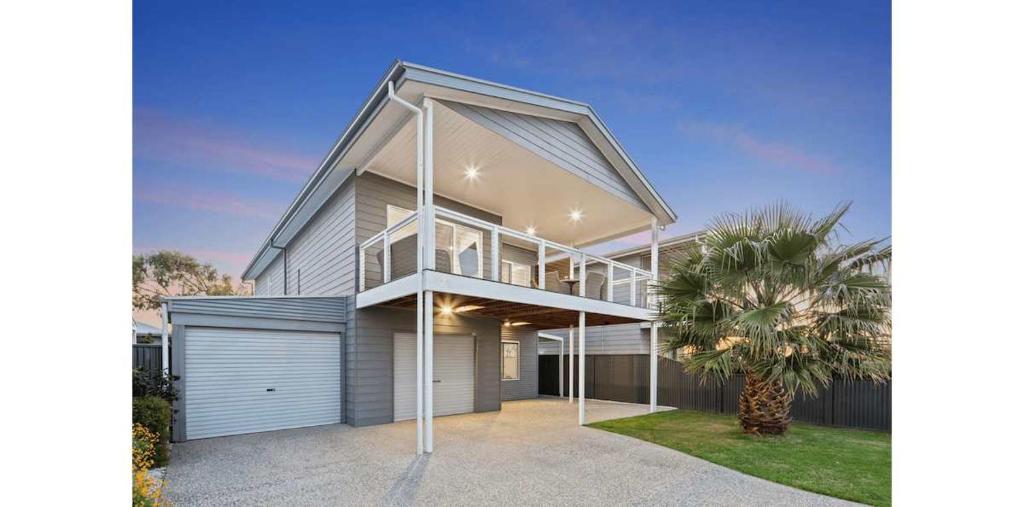 an image of a house with a garage at Aldinga Beach Reef Escape in Aldinga Beach