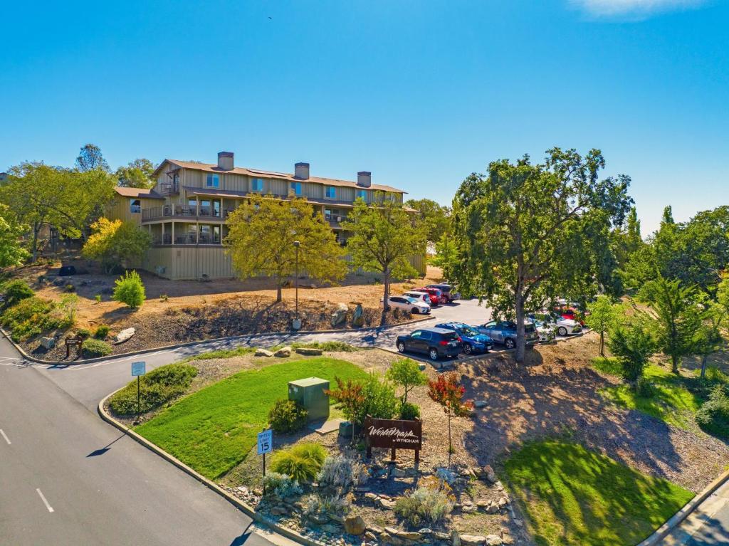 an aerial view of a building with a parking lot at WorldMark Angels Camp in Angels Camp