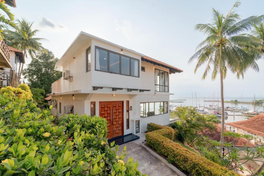 a house with a view of the ocean at SEA TO SKY Villa - 4 Bedrooms Ocean View in Pulau Nongsa
