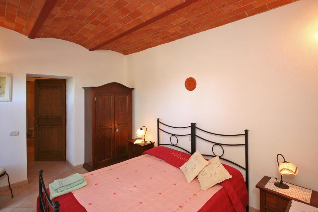 Postel nebo postele na pokoji v ubytování Pienza by PosarelliVillas