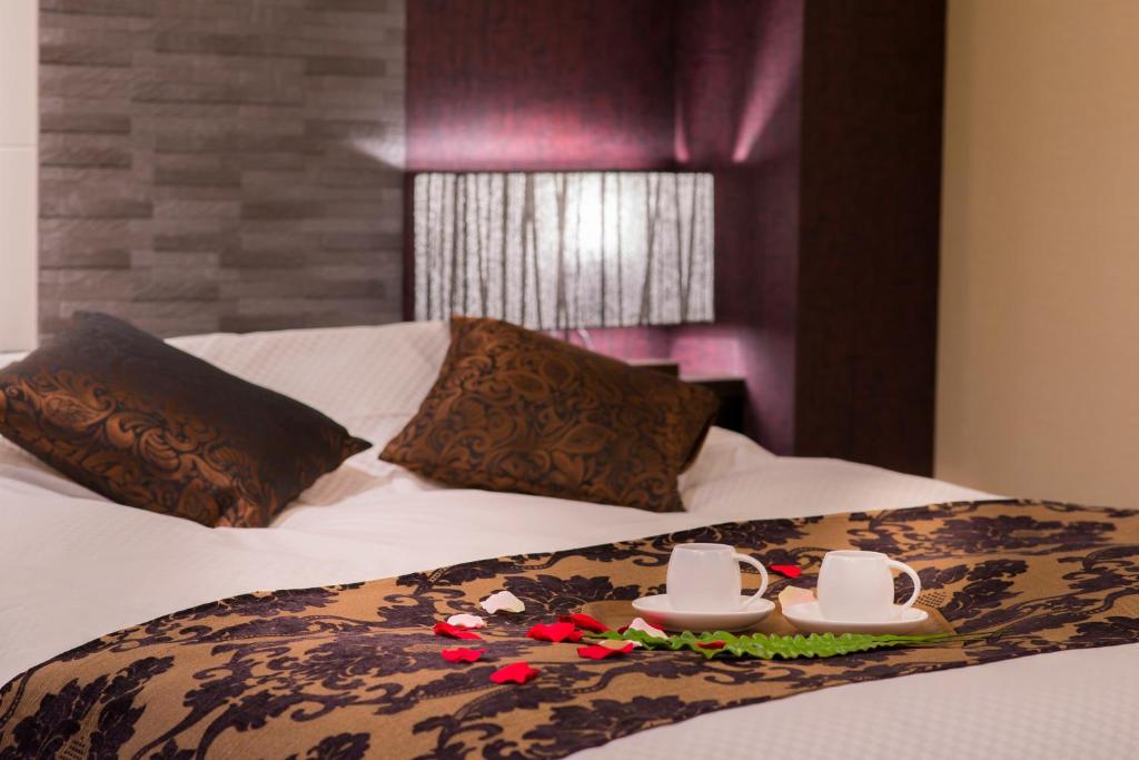 Postel nebo postele na pokoji v ubytování Hotel COREST (Adult Only)